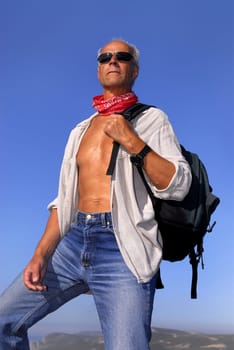 Handsome mature man posing outdoors