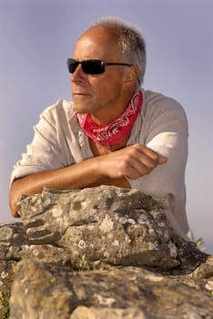 Handsome mature man posing outdoors