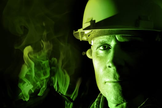 Portrait of a firemanr isolated in black