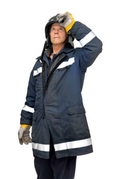 Fireman in uniform isolated in white