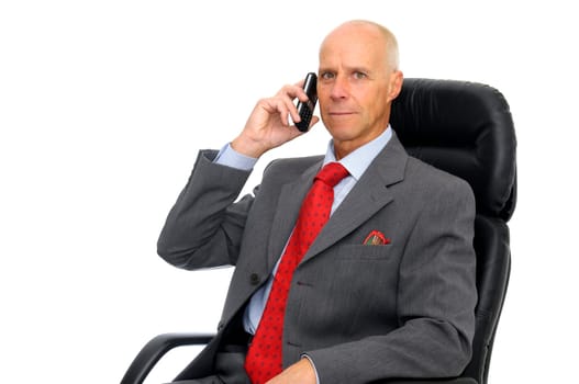 Mature man with cellphone isolated in white