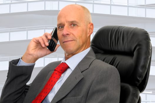 Mature man with cellphone isolated in white