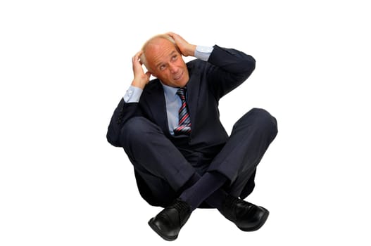 Scared mature businessman isolated in white