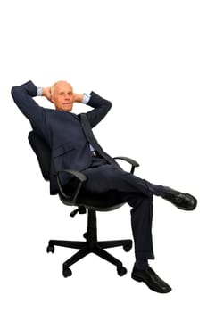 Mature businessman in a chair isolated in white