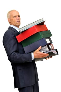Mature businessman with stack of files isolated in white