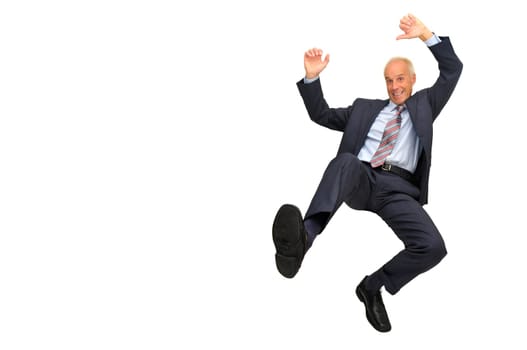 Mature businessman jumping isolated in white