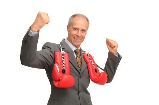 Businessman with boxing gloves isolated against a white background