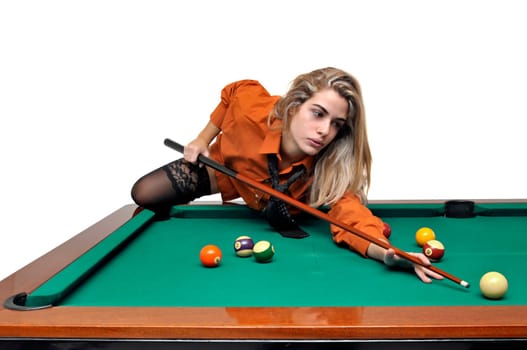 Sexy girl with man's shirt and tie playing snooker