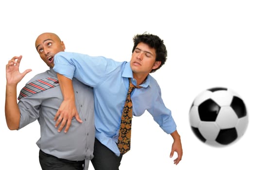 Two businessmen fighting in a soccer game isolated in white