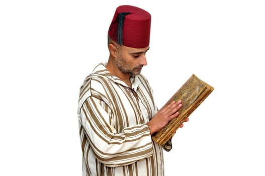 Arabic man with very old book isolated in white
