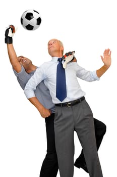Two businessmen playing soccer isolated in white