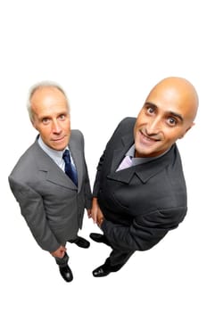 Two businessmen posing isolated in white
