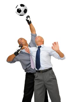 Two businessmen playing soccer isolated in white