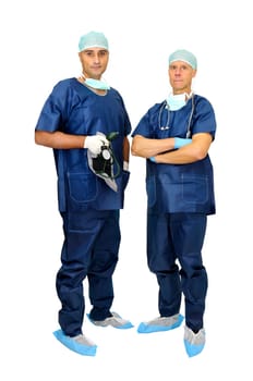 Doctors team in uniform posing isolated in white