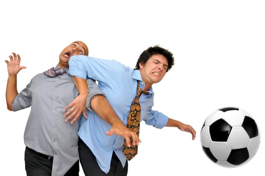 Two businessmen fighting for a soccer ball isolated in white