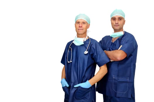 Doctors team in uniform posing isolated in white