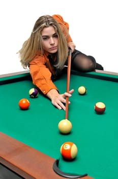 Sexy girl with man's shirt and tie playing snooker