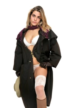 Sexy girl in cowboy outfit isolated in white