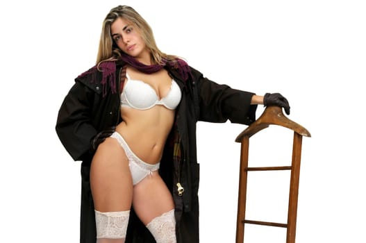 Sexy girl in cowboy outfit isolated in white