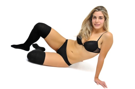 Sexy girl in black lingerie isolated in white