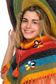 Sexy girl posing with a big sombrero hat isolated in white