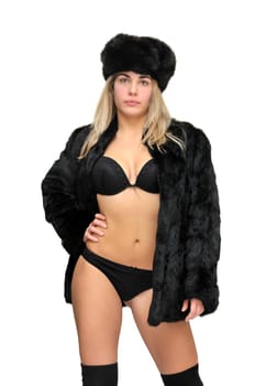 Sexy girl in furs and black lingerie isolated in white