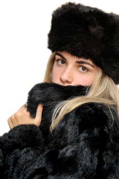 Sexy girl in furs and black lingerie isolated in white