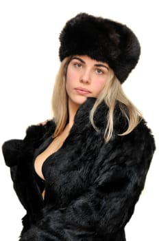 Sexy girl in furs and black lingerie isolated in white