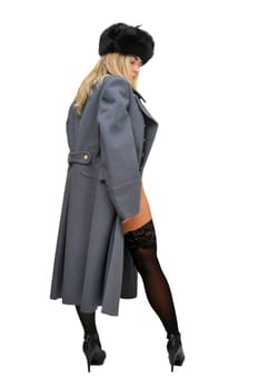 Sexy girl in russian army greatcoat and lingerie isolated in white
