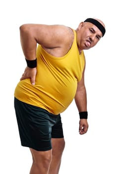 Large and tired fitness man with back pain isolated in white