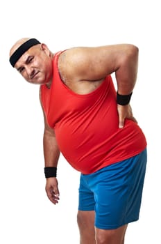 Large and tired fitness man with back pain isolated in white