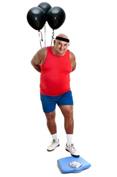 Large fitness man with weight scale and balloons isolated in white