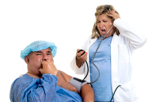 Large male patient in a wheelchair with doctor