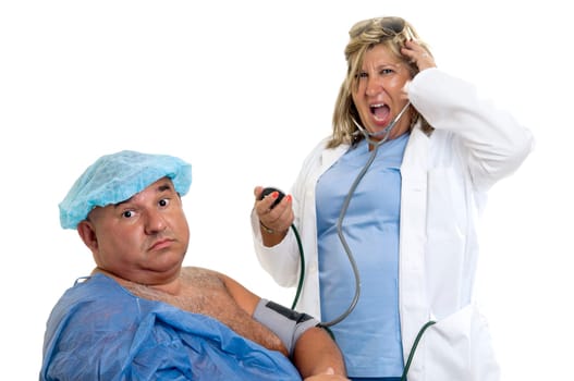Large male patient in a wheelchair with doctor