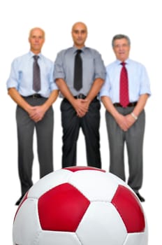 Businessmen playing soccer isolated in white