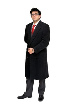 Young businessman posing with greatcoat isolated in white