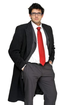 Young businessman posing with greatcoat isolated in white