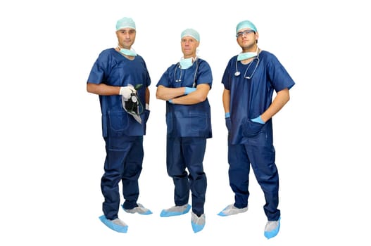 Doctors team in uniform posing isolated in white
