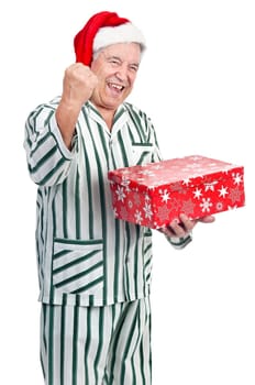 Happy senior with Christmas hat and gift box