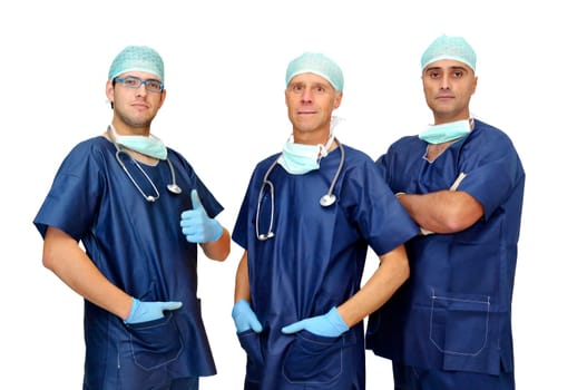 Doctors team in uniform posing isolated in white