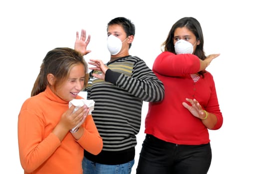Group of children with masks against the flu and one already sick