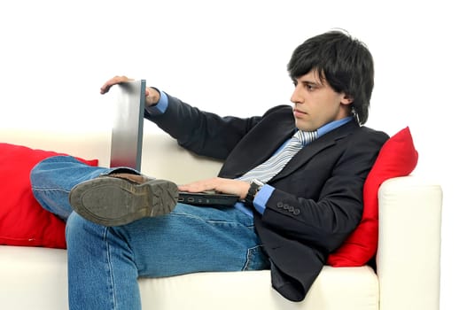 Business man with laptop isolated in white