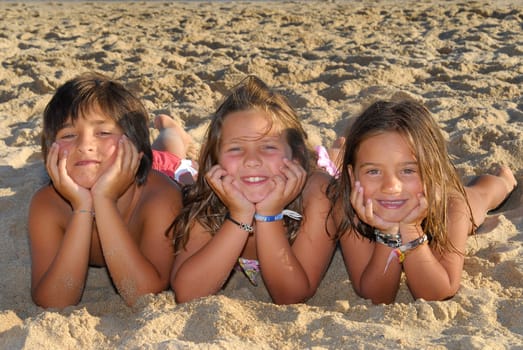 Three brothers in the beach