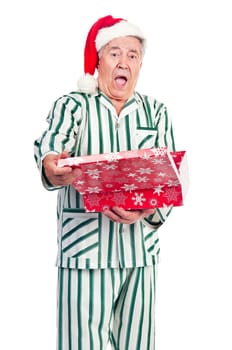 Happy senior with Christmas hat and gift box