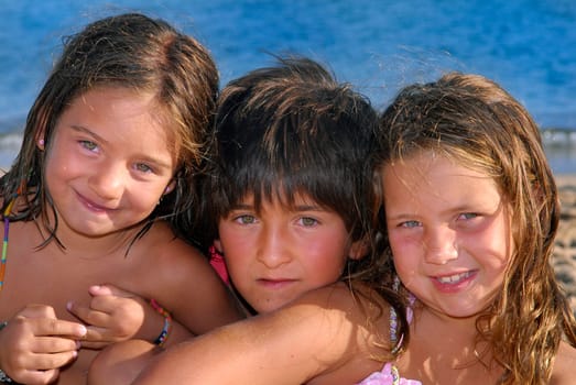Three brothers in the beach