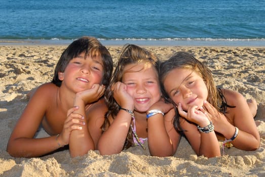 Three brothers in the beach