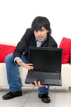 Business man with laptop isolated in white