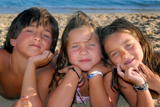 Three brothers in the beach