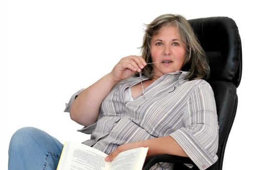 Beautiful mature woman with book isolated in white