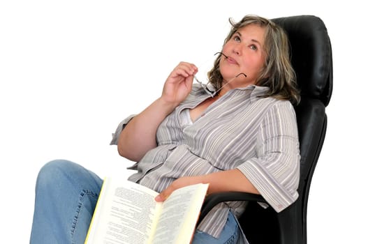 Beautiful mature woman with book isolated in white